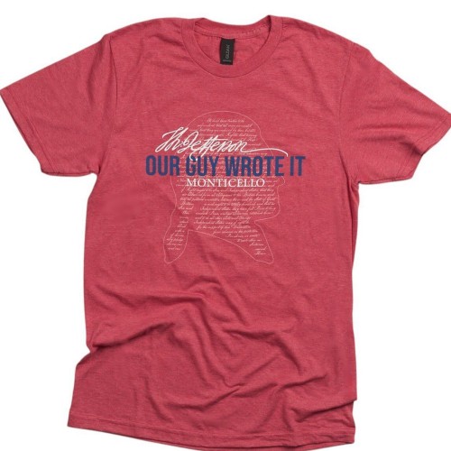 Red t-shirt with outline of Thomas Jefferson's profile, filled in with words from the Declaration of Independence, and the words "Our Guy Wrote It" overlaid