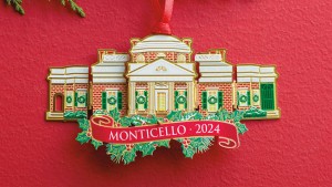 Monticello tree ornament decorated with wreaths and Christmas 2024 written in a scroll at the bottom