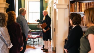 Historical interpreter Bill Barker leads guests through the Library and Cabinet rooms at Monticello