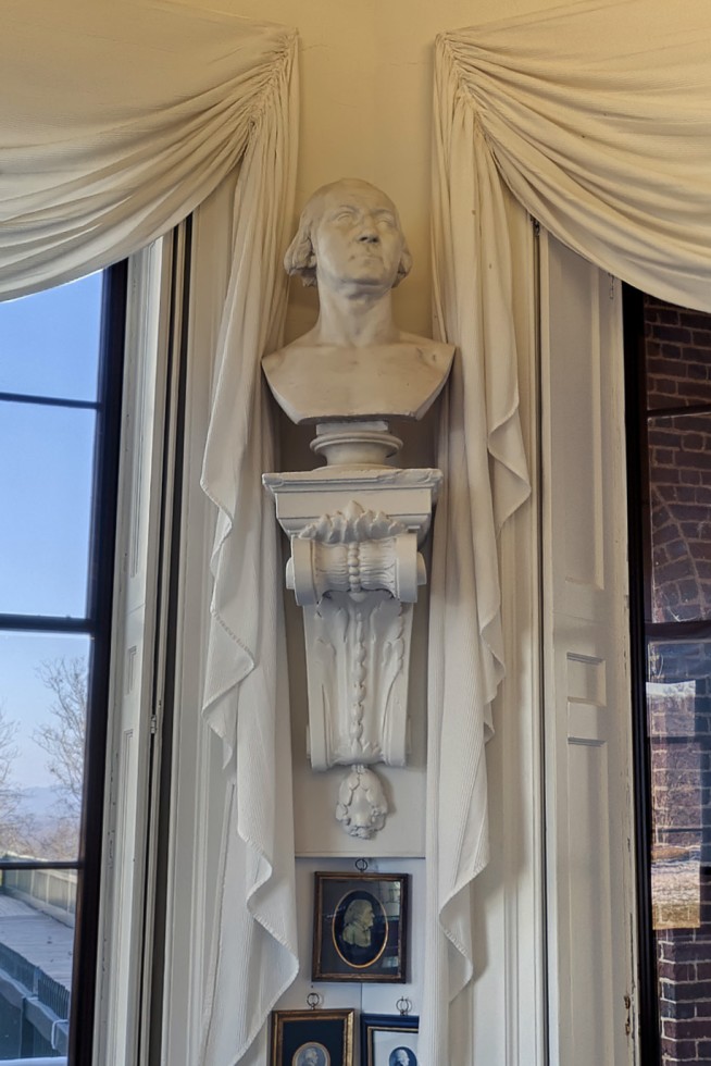 Bust of George Washington on a wall bracket pedestal in Montiello's Tea Room